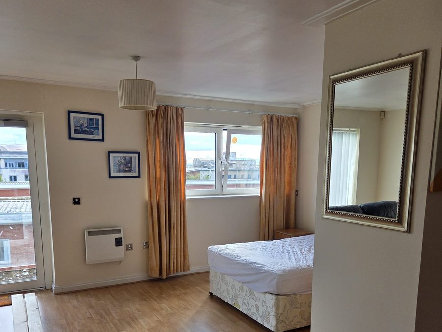 Finished bedroom of a one-bed flat